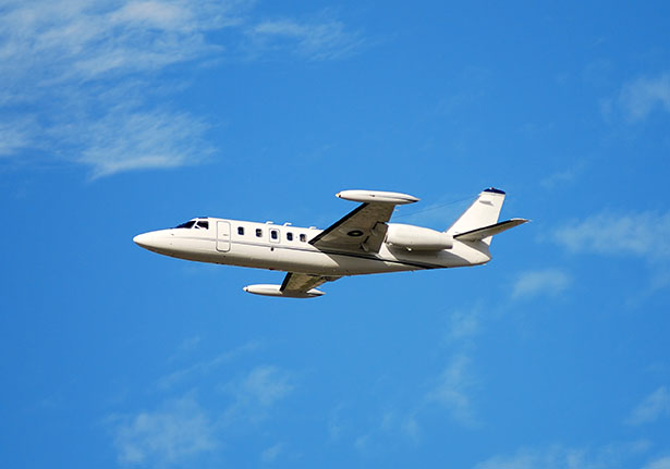 luxury private jet in flight